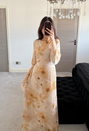 Tie back chiffon dress in yellow bloom floral