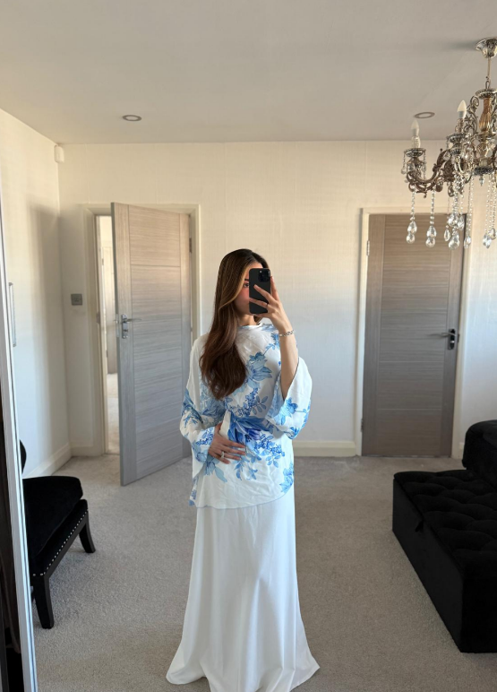 Tie asymmetric hem woven top in blues