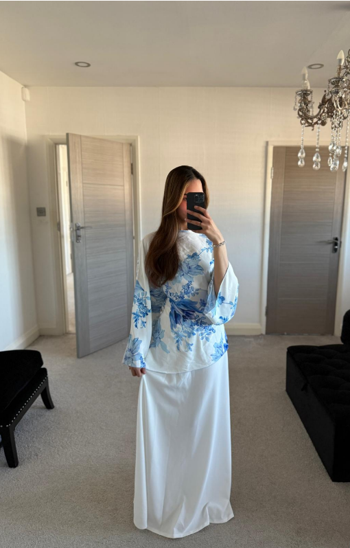 Tie asymmetric hem woven top in blues