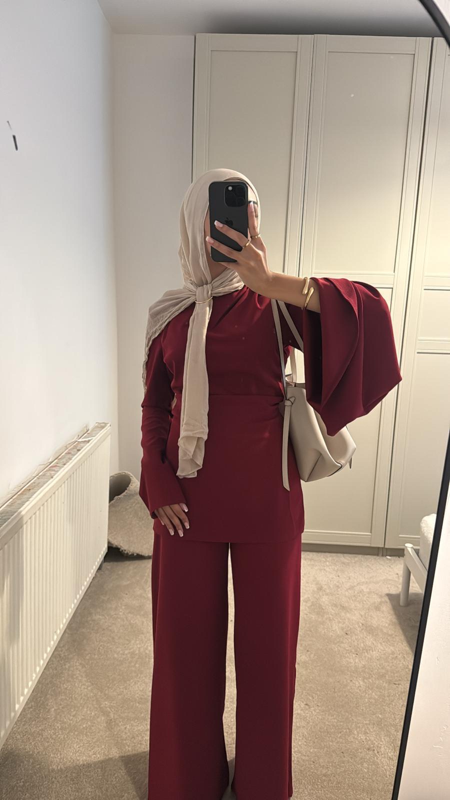 One flare one straight sleeve detail co ord set in burgundy