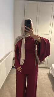 One flare one straight sleeve detail co ord set in burgundy