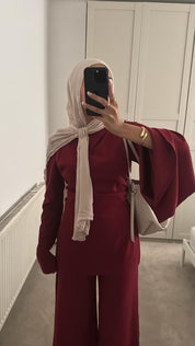 One flare one straight sleeve detail co ord set in burgundy