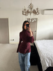 High neck ruffle detail tie back long top