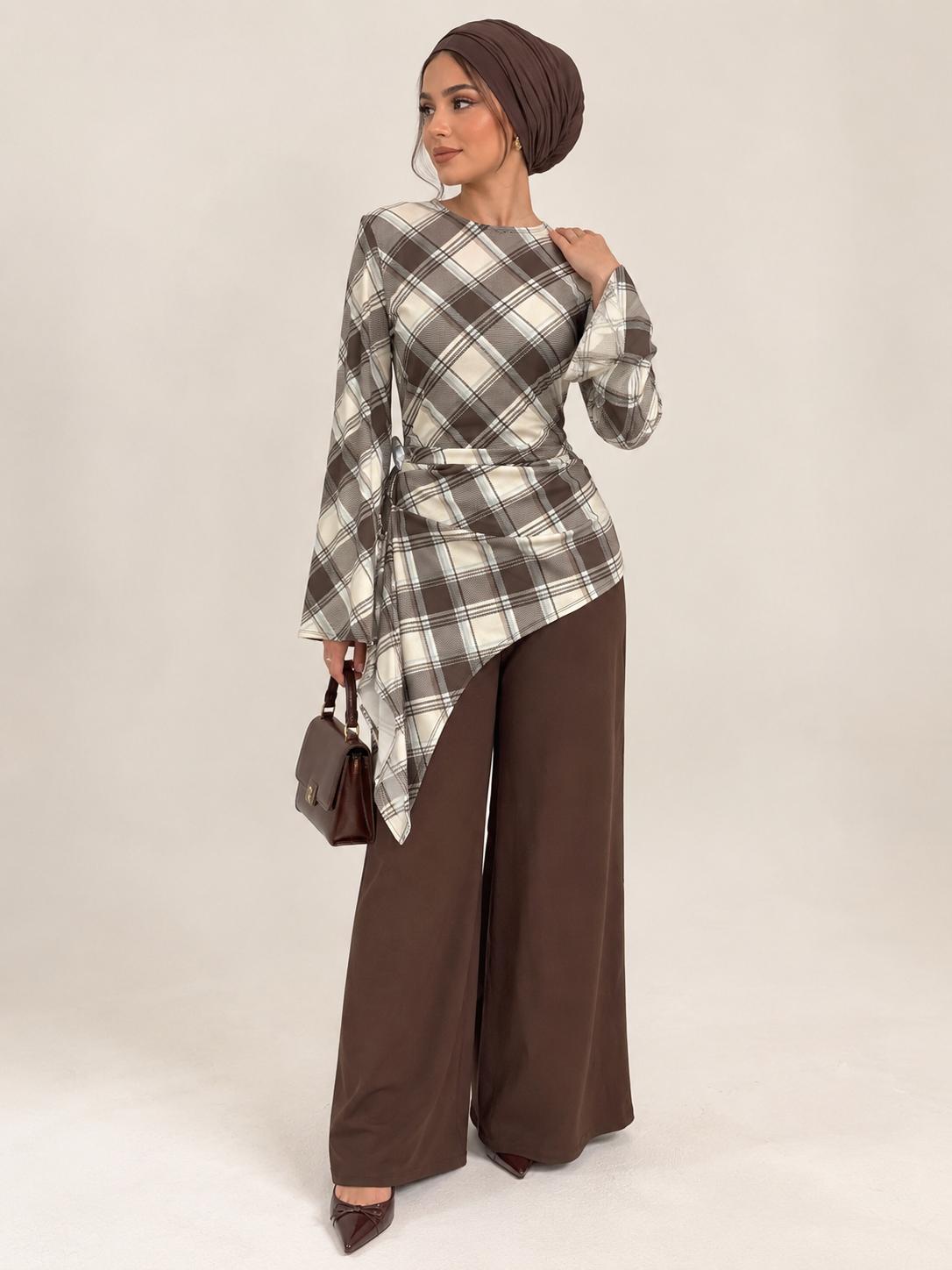 Modest asymmetric long top with tie back in check