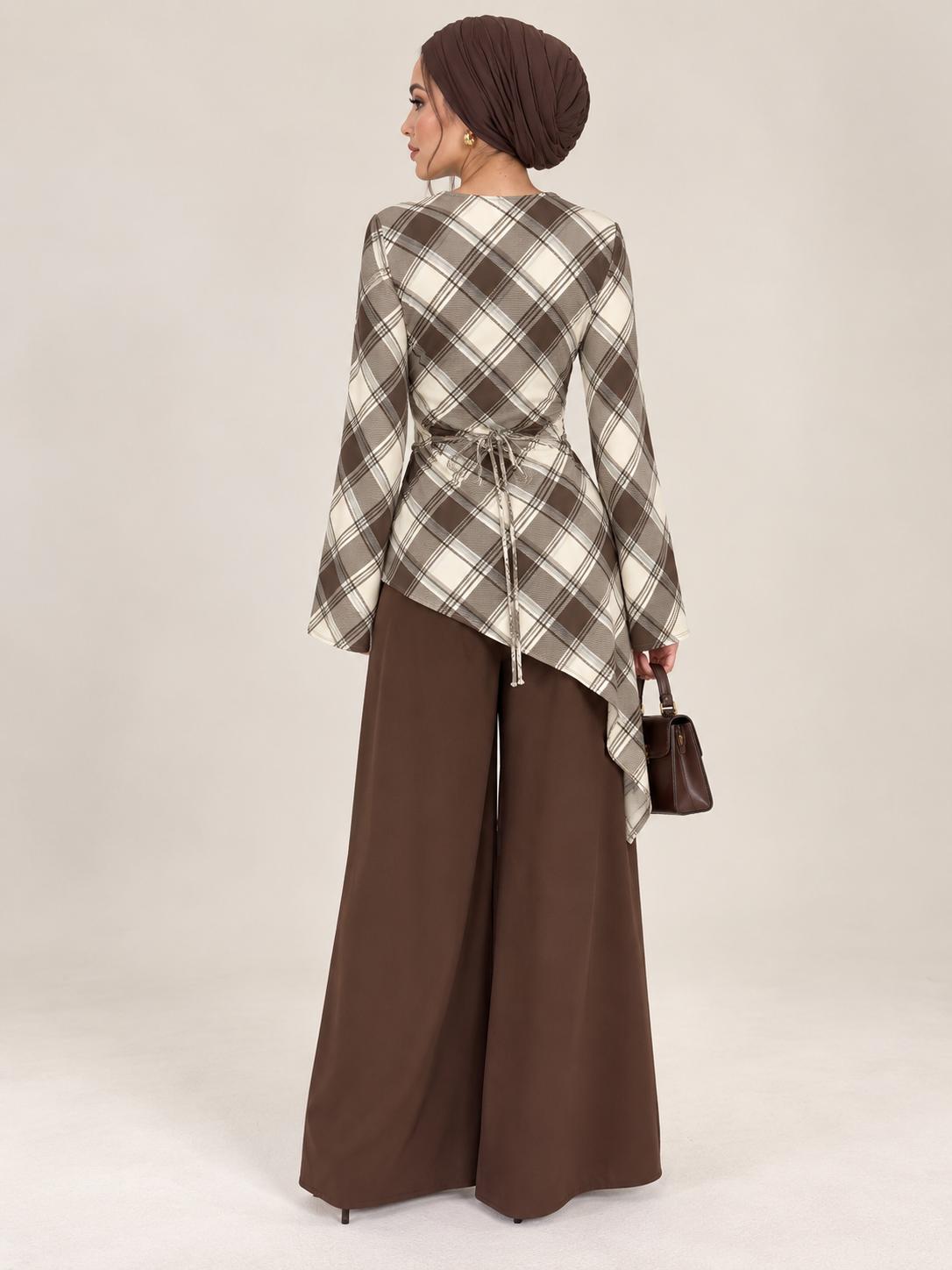 Modest asymmetric long top with tie back in check