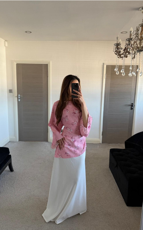 Tie back asymmetric woven top in pretty pink